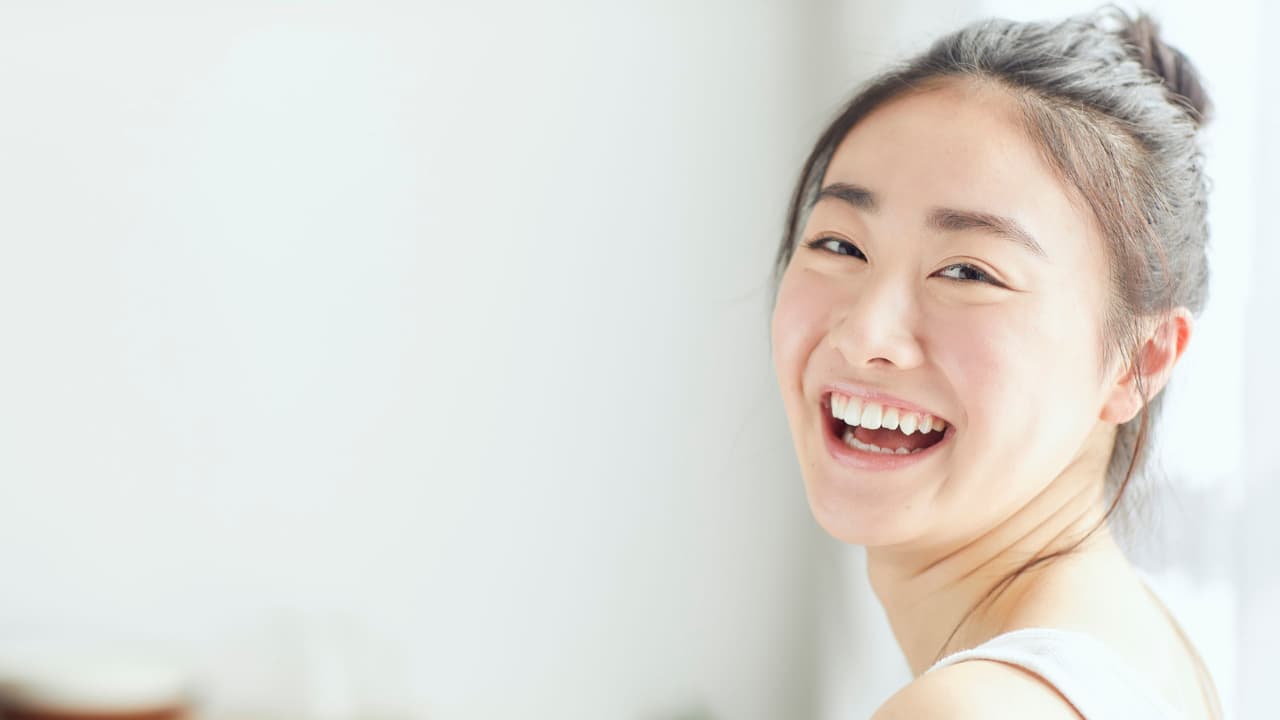 成果を実感して笑顔の女性